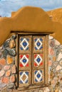 Ornate Hand Carved Gate On Pueblo Style Building