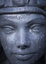 Ornate hand made Cleopatra statue with rain drops