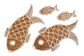 Ornate hand painted gingerbread fishes isolated on white background Royalty Free Stock Photo