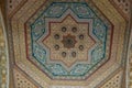 Ornate handcarved wooden ceiling insert at the ancient Bahia Pal Royalty Free Stock Photo