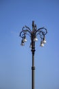Ornate Iron Lamppost with Blue Sky