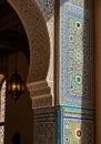 Ornate Islamic architecture detail featuring intricate geometric tilework and stucco. Royalty Free Stock Photo