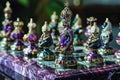 Ornate jeweled chess set with elaborate details on marble game board, showcasing craftsmanship Royalty Free Stock Photo