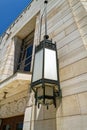 An ornate lamp hangs at the entrance to the Sanpete County Courthouse in Manti, Utah, USA - June 12, 2022