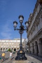 Ornate Lamp Post in front of the historic Town Hall of La Coruna in Maria Pita Sqaure in A Coruna, Galicia, Spain
