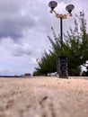 Ornate lamp post on promenade Royalty Free Stock Photo