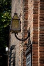 Ornate lamp on the wall of Castelvecchio, Verona, Italy