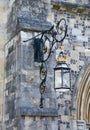 Ornate lantern on a stone wall