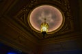 ornate light fixtures inside the beaux arts kansas city museum mansion