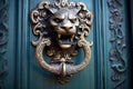 ornate lion-shaped brass door handle in sunlight