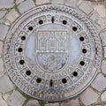 Ornate Manhole Cover in Prague Royalty Free Stock Photo