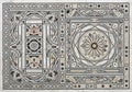 Ornate marble floor mosaic with symmetrical geometric patterns in black, gray, and Royalty Free Stock Photo