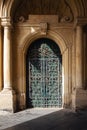 Ornate metal and wood door to the grandmaster`s palace courtyard in Valletta, Malta Royalty Free Stock Photo