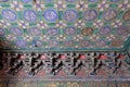 An ornate painted ceiling on a building in the Forbidden City in Beijing Royalty Free Stock Photo