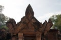 Ornate pediment above doorway at 10th century Banteay Srei temple