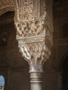 Ornate pillar column head carven from stone in the Alhambra palace, Granada Royalty Free Stock Photo