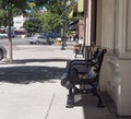 Ornate Public Steel Bench in Shade Wide View