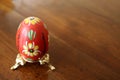 Ornate Pysanky Ukrainian Easter Eggs in a Gold Holder