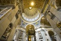 The ornate, renaissance interior, dome, cupola and ceiling of St Peter`s Basilica in Vatican City Royalty Free Stock Photo