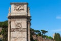 Roman pillar, end of Arch of Constantine and the Colosseum Rome, Italy Royalty Free Stock Photo