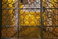 Ornate rusty garden entrance door made of iron.