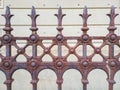 Ornate rusty iron fence