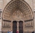 Arched Entrance, Notre dame cathedral, Paris, France Royalty Free Stock Photo