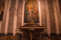 Ornate sheep statue against beautiful painting on wall at gothic La Seu church