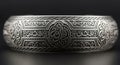 Ornate silver bangle with Arabic script Royalty Free Stock Photo