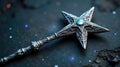 An ornate silver star-shaped scepter with a captivating teal gemstone rests on a dark textured surface, sparkling with subtle Royalty Free Stock Photo
