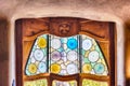 Ornate stained-glass window in Casa Batllo, Barcelona, Catalonia