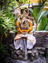 An ornate statue of Ganesha with a swastika on his hand 3