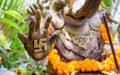 An ornate statue of Ganesha with a swastika on his hand 4