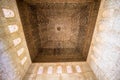 Ornate ceiling carvings in Alhambra palace Granada, Spain