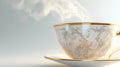 Elegant steaming teacup with gold trim and ornate pattern on white background Royalty Free Stock Photo