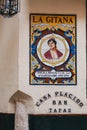 Ornate tiled sign outside La Gitana tapas bar and restaurant in Seville, Spain