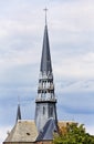 Ornate tower with slate roofing, Sint-Janskerk, Gouda, Netherlands. Royalty Free Stock Photo