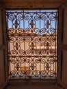 Ornate traditional window grid of a berber house ruin in the city center of Amezrou