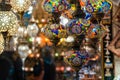 Ornate and vibrant collection of Turkish lamps hanging in front of a market Royalty Free Stock Photo