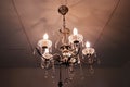 Ornate Vintage lamp illuminated gold chandelier Royalty Free Stock Photo