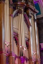 Musical instrument craftsmanship. Ornate vintage pipe organ pipes Royalty Free Stock Photo