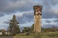 Ornate water tower painted with flowers