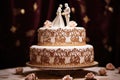 an ornate wedding cake with two figurines on top