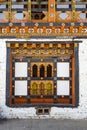 Ornate window and balcony inside of Mongar Dzong monastery in Mongar, Bhutan