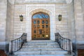 Ornate wooden door on church Royalty Free Stock Photo