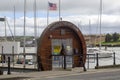 The ornate wooden entrance to the Kinsale Yacht Club moorings on the main street of the tourist town of Kinsale near the
