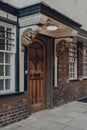 Ornate wooden front door of a traditional English house in Oxford, UK