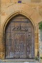 Ornate wooden gate with metal accents in old town Casco Viejo in Pamplona, Spain Royalty Free Stock Photo