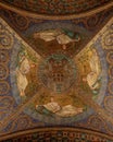 Ornately decorated domed ceiling with gold-painted accents inside the Aachen Cathedral in Germany Royalty Free Stock Photo