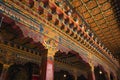 Ornately decorated Tibetan-style brackets and ceiling